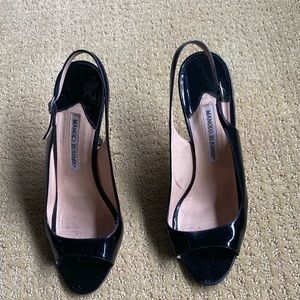 Manolo Blahnik black patten sling back heels.